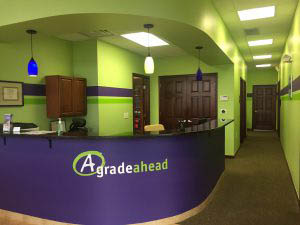 A Grade Ahead of Powell Learning Academy Front Desk Purple Green Classes